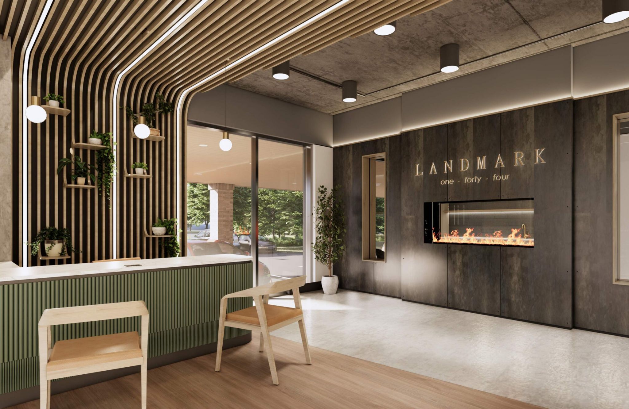 Modern lobby at Landmark at Dublin features wood accents, green plants, a fireplace, and a reception desk for welcoming Dublin apartments seekers.
